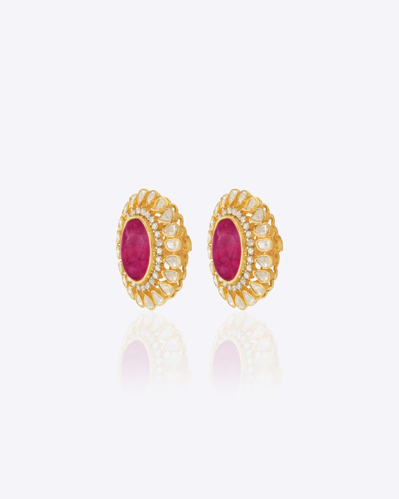 14k gold stud earrings with ruby center and uncut diamond halo