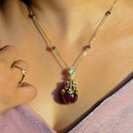 Regal Ruby Pendant in 14K gold with pastel beads and a ruby drop
