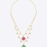 14K gold layered necklace with square-cut gems, Polki, and diamonds.