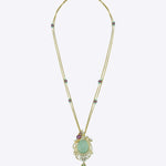 14K gold necklace with a luminous emerald surrounded by Polki diamonds.