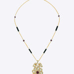 14K gold Obsidian Petal necklace with Polki, diamonds, and black onyx in a floral design.