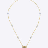 14k gold necklace with Polki, diamonds, and tanzanite accents