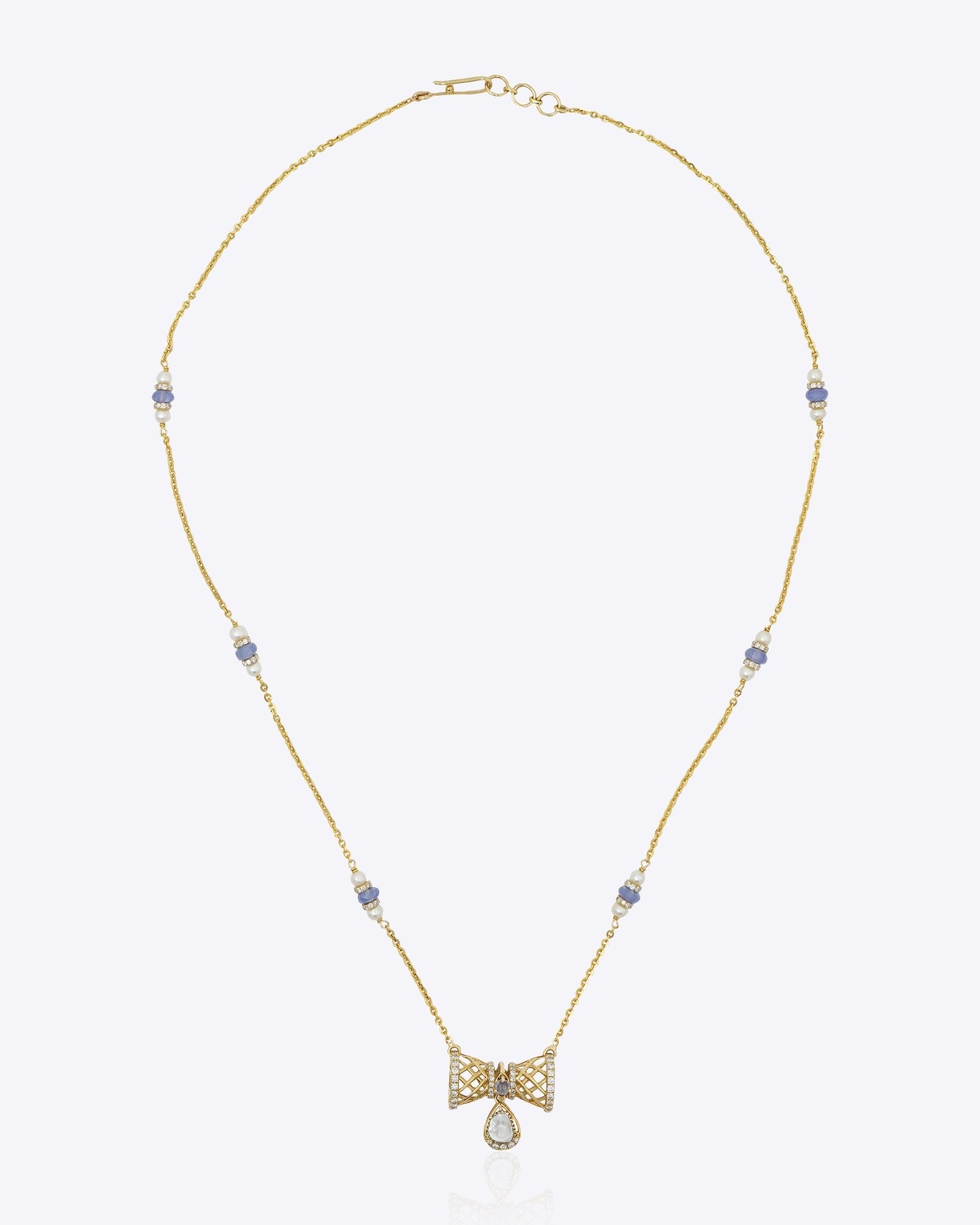 14k gold necklace with Polki, diamonds, and tanzanite accents