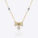 14k gold necklace with Polki, diamonds, and tanzanite accents