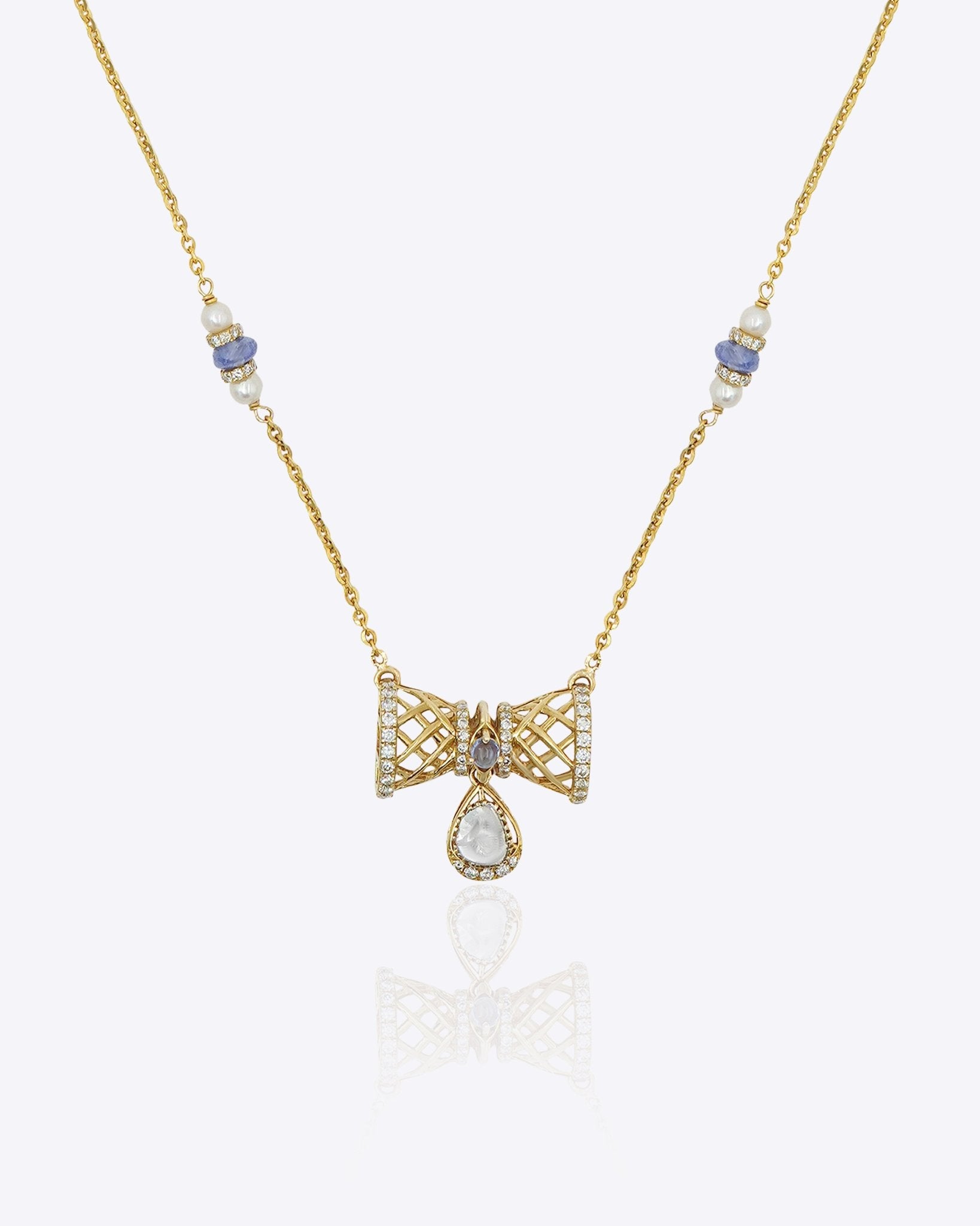 14k gold necklace with Polki, diamonds, and tanzanite accents