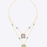 14k gold necklace with layered floral pendants in tanzanite, enamel, and Polki