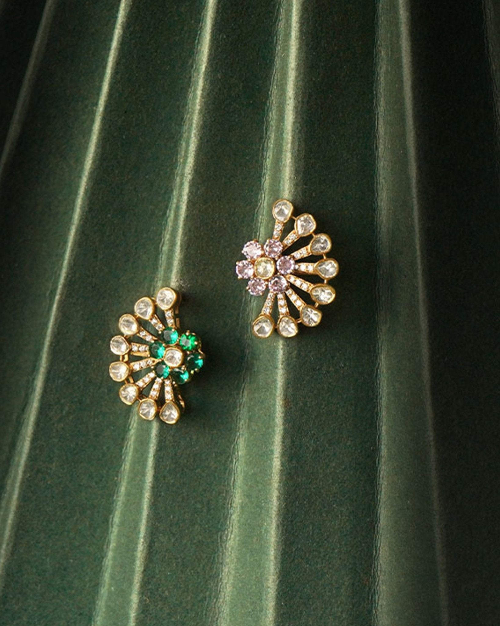 14k gold stud earrings with sunburst Polki and green-pink gemstones