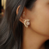 14k gold stud earrings with sunburst Polki and green-pink gemstones