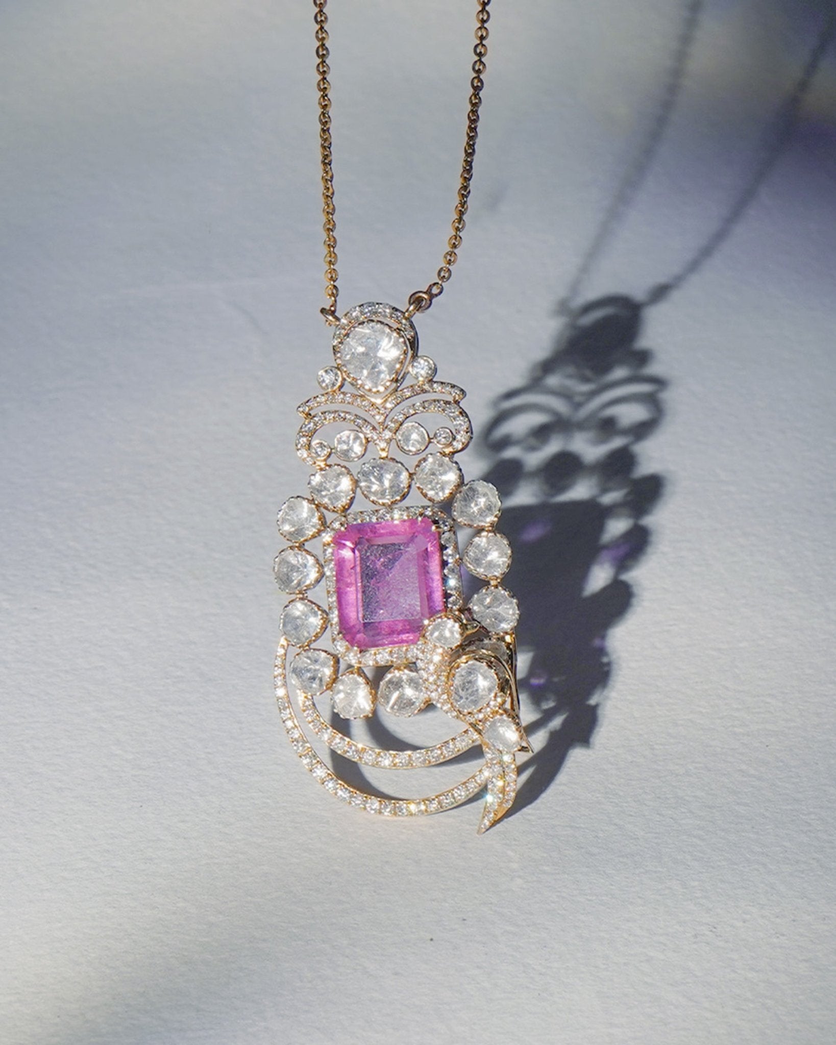 Vintage Grace Pendant in 14k gold with radiant pink gemstone and Polki diamond framing.