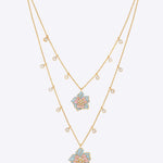 Secret Garden Necklace in 14k gold with a floral Polki centrepiece and double chain