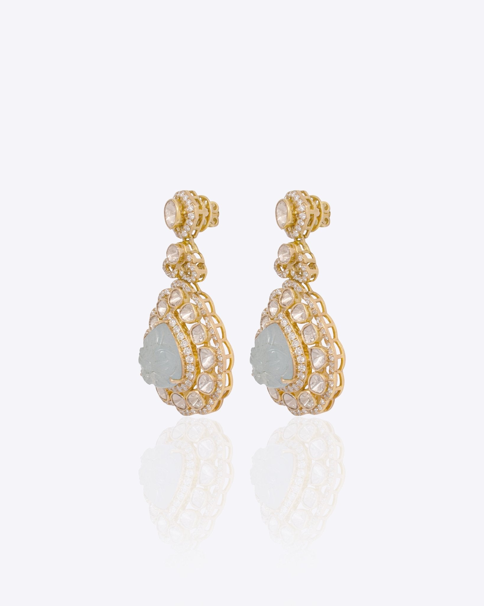 14K gold drop earrings with carved aquamarine petals and fine Polki diamond accents.