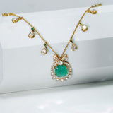 Emerald Bow Pendant