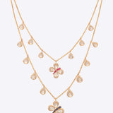 14k gold Papillon Dream Necklace with double-layered chain and Polki droplets.