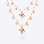 14k gold Papillon Dream Necklace with double-layered chain and Polki droplets.
