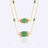 14K gold necklace with emerald-green gemstones and ruby accents