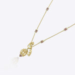 14K gold peacock-inspired pendant featuring luminous Polki accents with delicate moonlit brilliance.