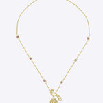 14K gold peacock-inspired pendant featuring luminous Polki accents with delicate moonlit brilliance.