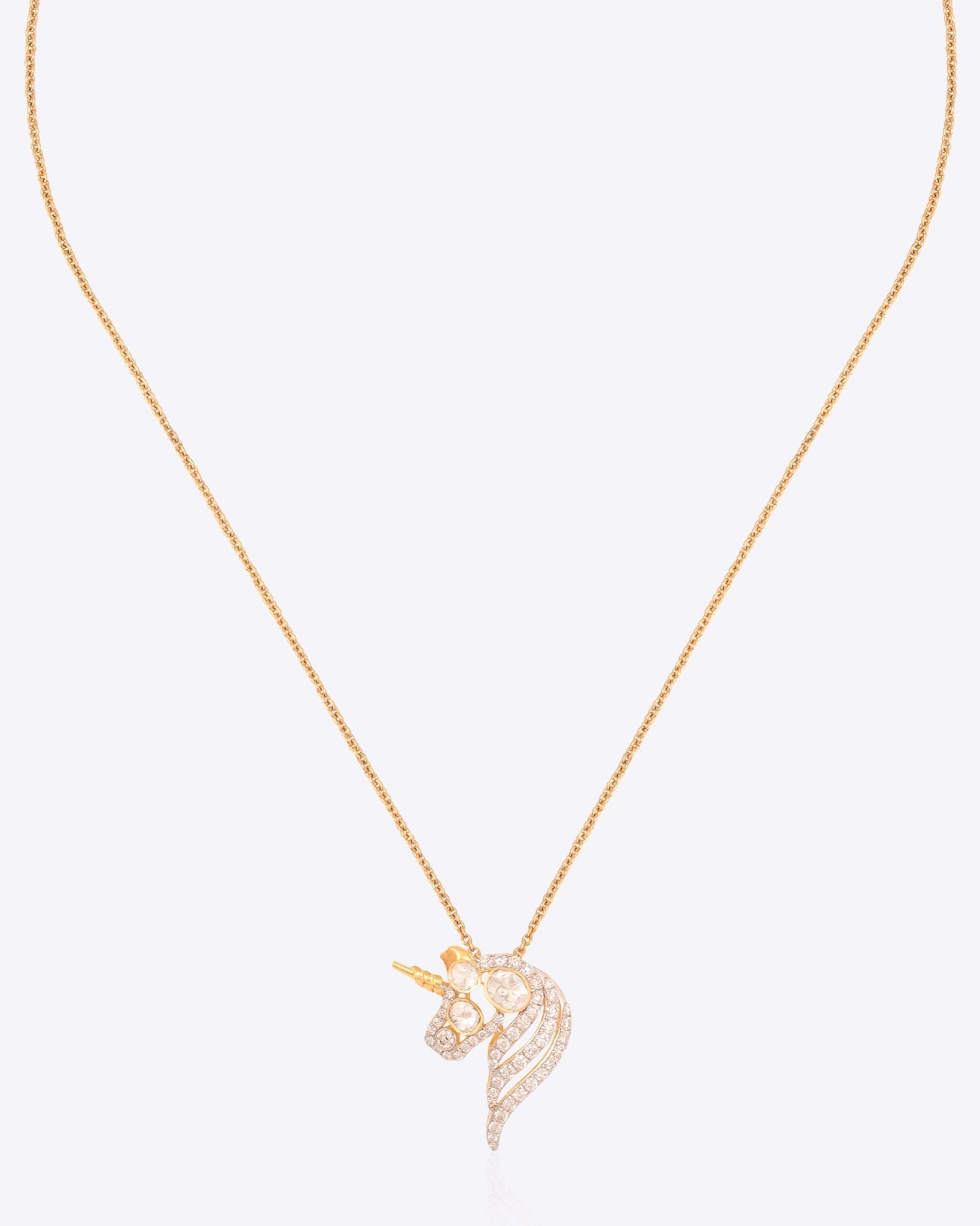 Unicorn Polki Pendant in 14K gold with radiant diamond detailing on a sleek chain.