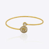 14K gold Opulent Glow bangle with Polki and diamond accents.
