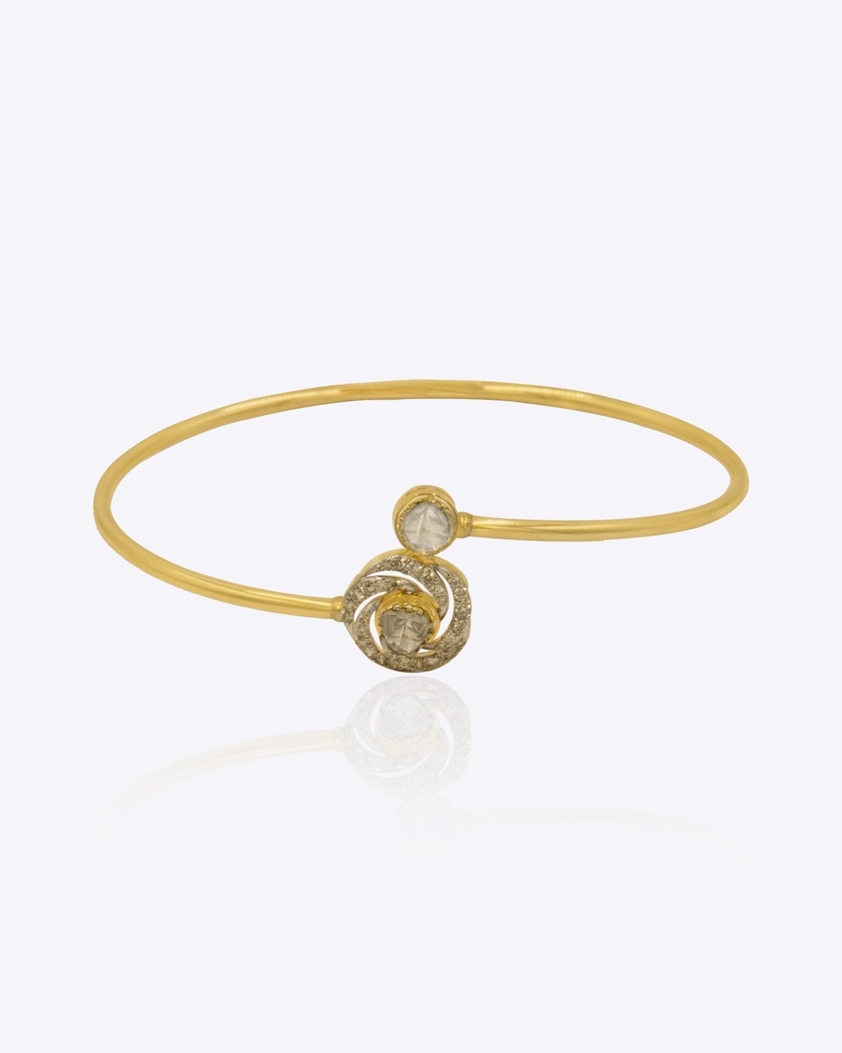 14K gold Opulent Glow bangle with Polki and diamond accents.
