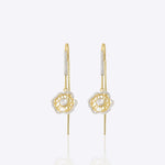 9k gold linear thread earrings with floral Polki accents and elegant detailing