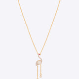 Serene Flamingo Necklace in 14K gold with a Polki flamingo motif and ruby accent
