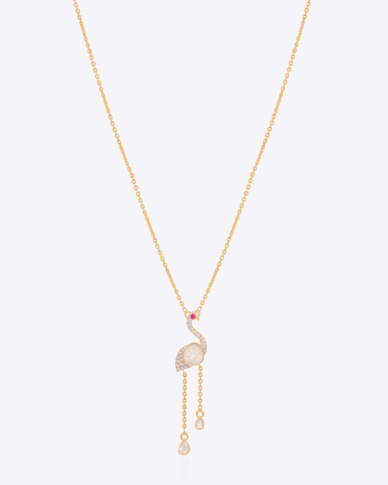 Serene Flamingo Necklace in 14K gold with a Polki flamingo motif and ruby accent