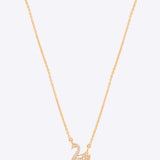 Swancrest Pendant in 14K gold with a sleek crest silhouette and diamond accents.