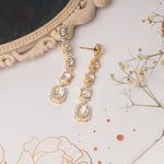14K gold Noorline Polki dangler earrings.