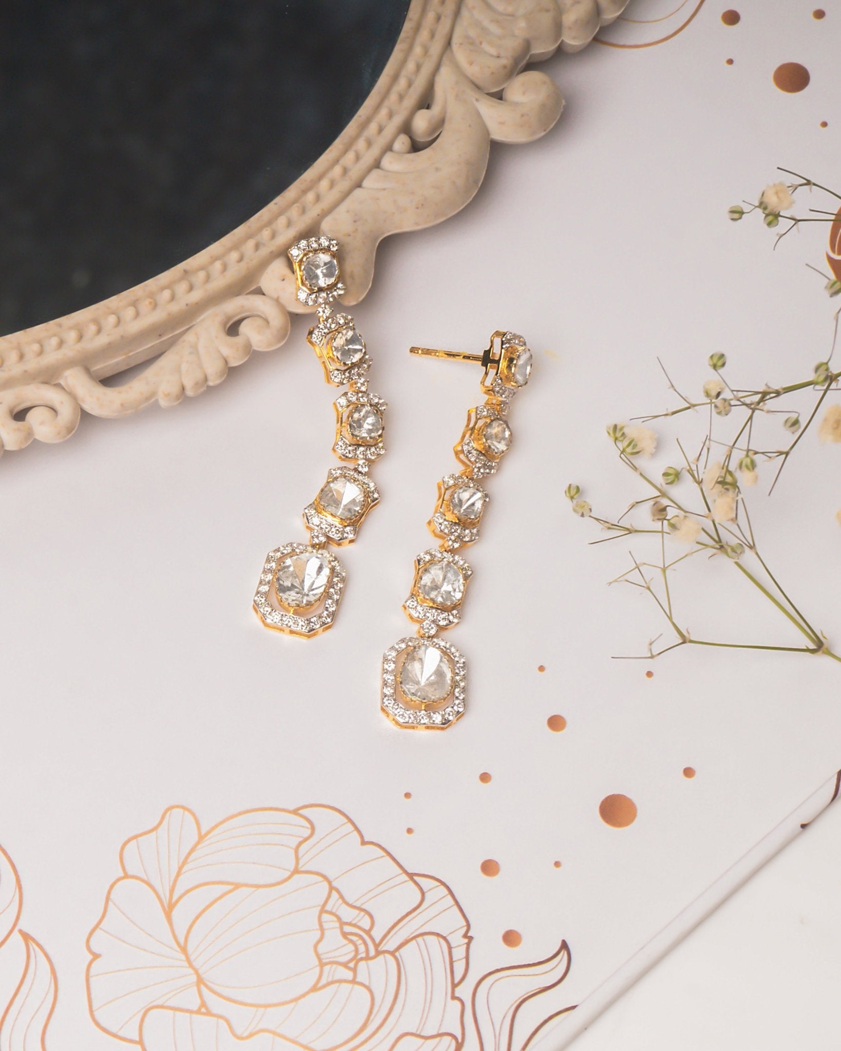 14K gold Noorline Polki dangler earrings.