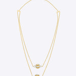 Swing & Ring Necklace in 14K gold with polki, diamonds, and soft pearls.