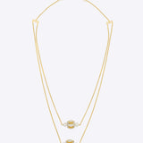 Swing & Ring Necklace in 14K gold with polki, diamonds, and soft pearls.