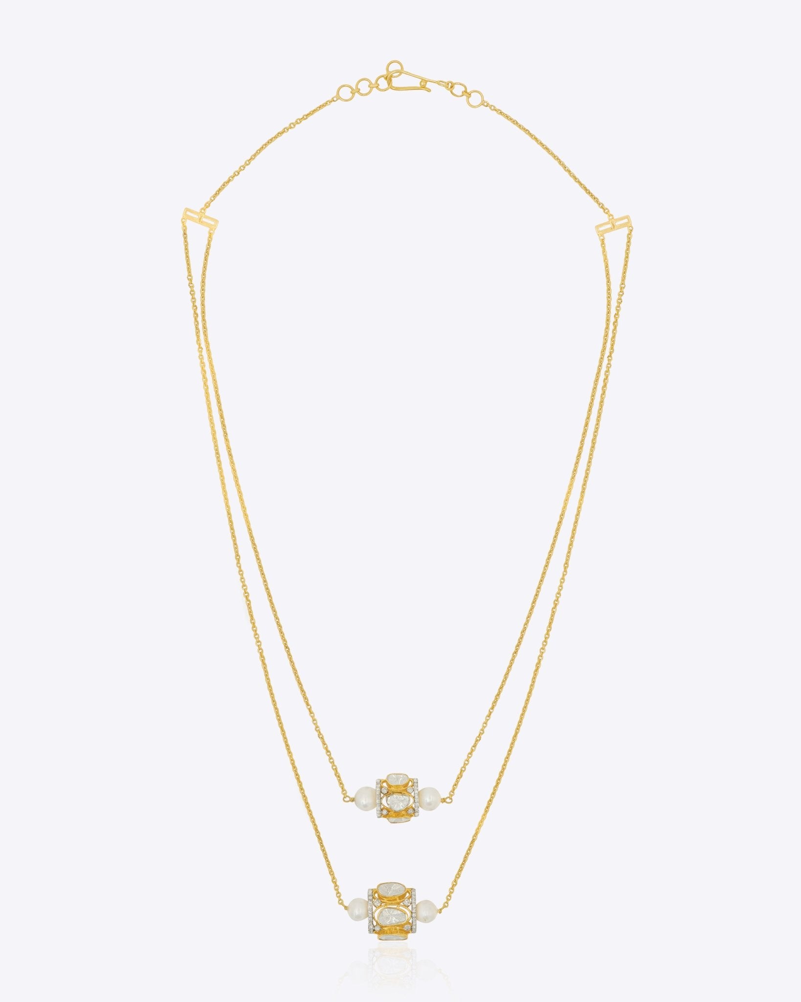 Swing & Ring Necklace in 14K gold with polki, diamonds, and soft pearls.