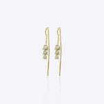 9k gold floral drop earrings with cascading lily petals and Polki accents