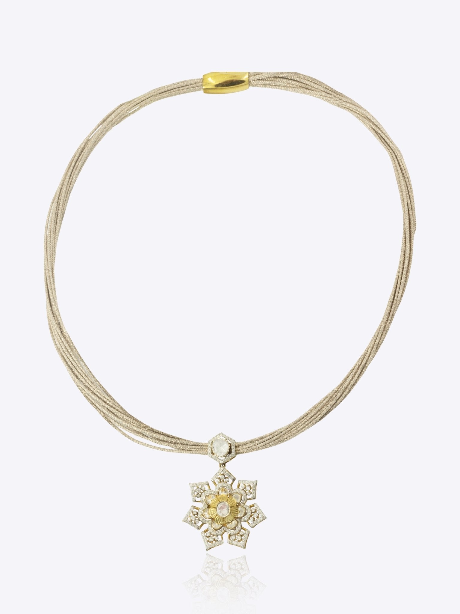 9k gold artistic necklace with starburst centerpiece and twisted detailing with minimal polki design