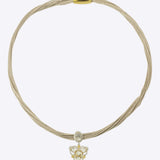 9k gold Zenith Thread necklace with triangular Polki centerpiece and textured finish