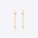 Twirl & Drop detachable earrings in 14K gold with diamond-studded swirl motif.
