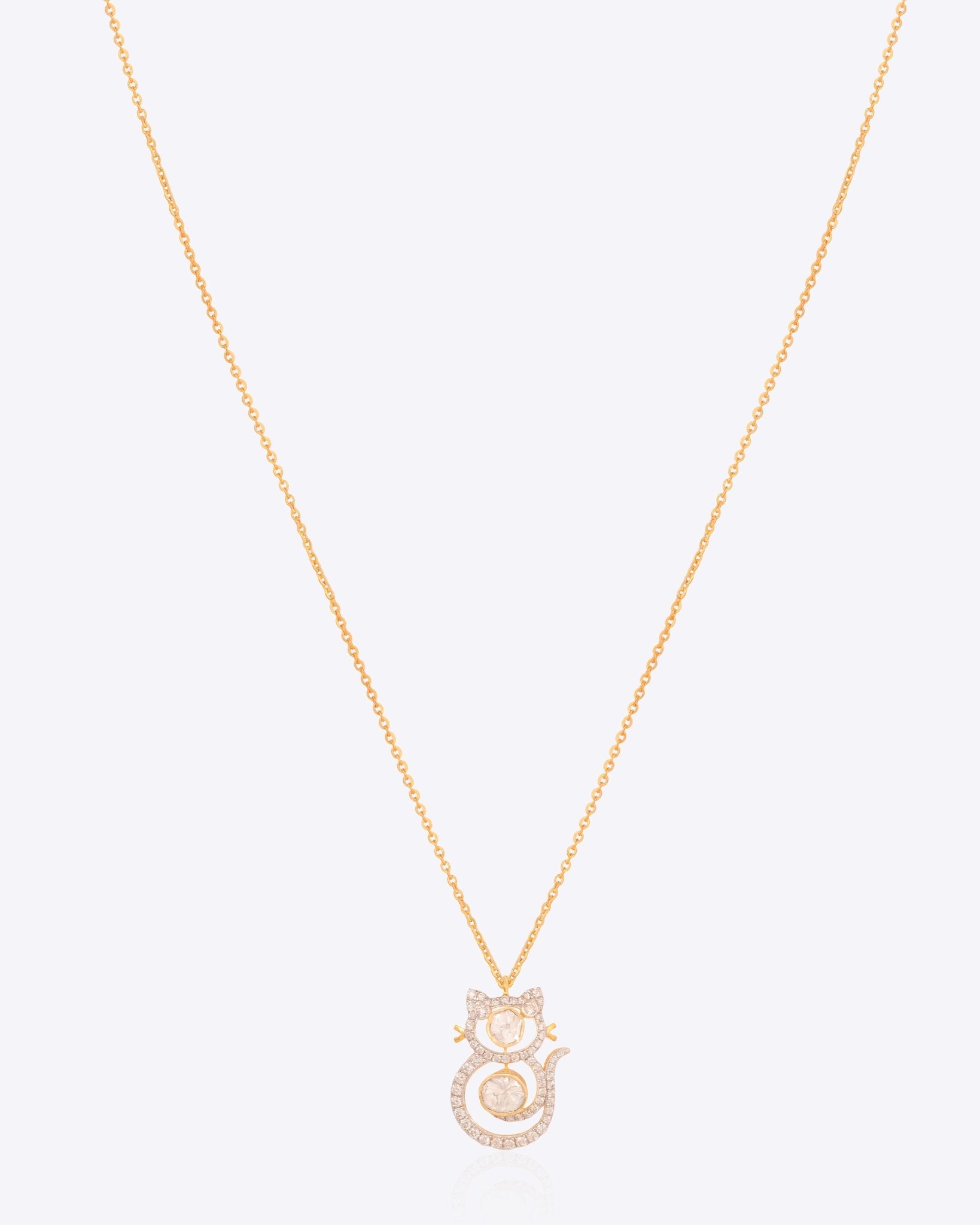 Whimsy Feline Pendant in 14K gold with playful cat silhouette and Polki diamond sparkle.