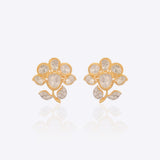 18K gold floral stud earrings with a Polki bloom and gold leaf accent.