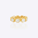 14K gold ring with a graceful arc design and bezel-set Polki diamonds