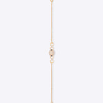 14k gold bracelet with an oval Polki diamond and pearl chains