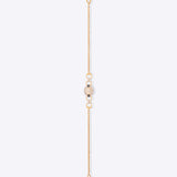 14k gold bracelet with an oval Polki diamond and pearl chains
