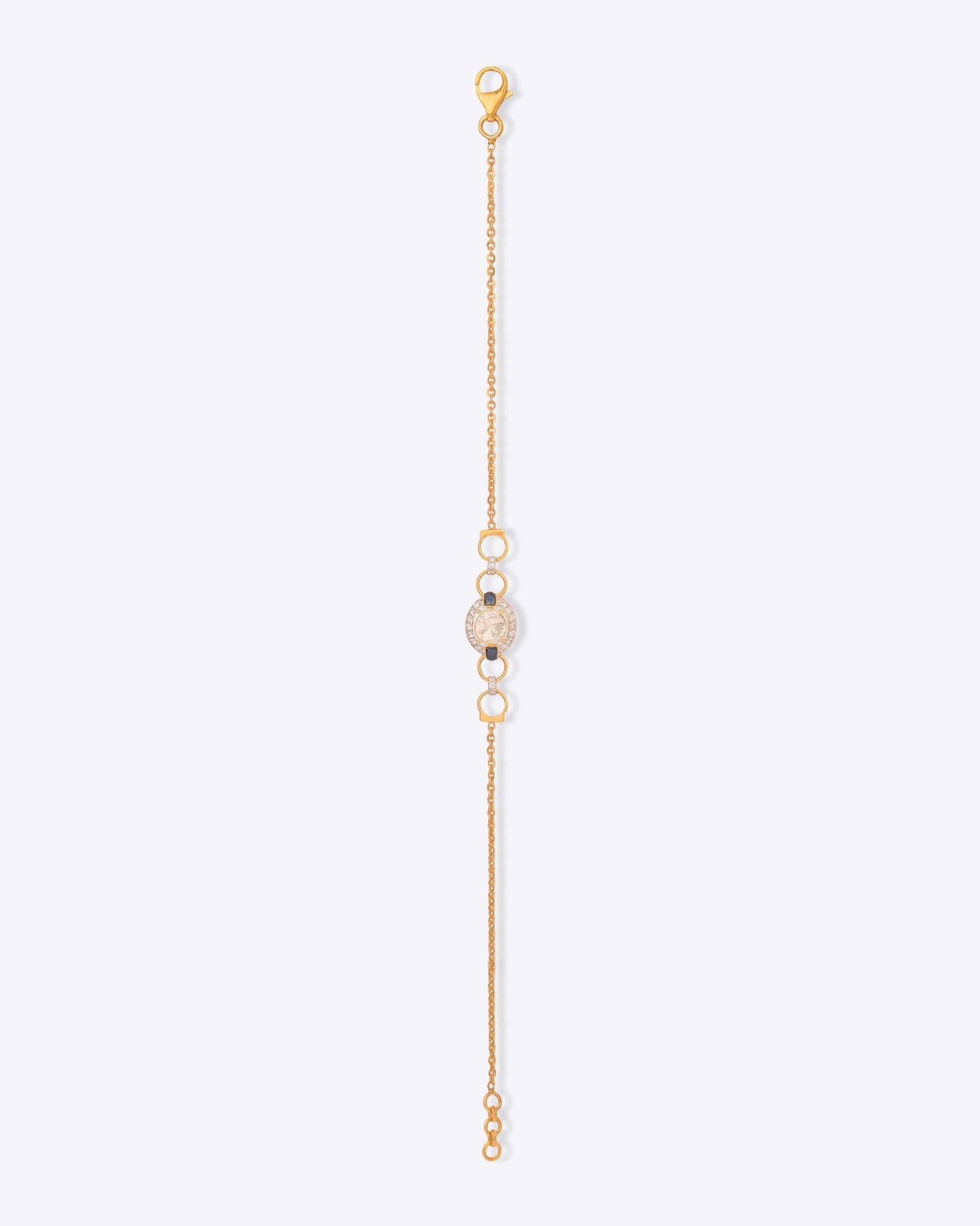 14k gold bracelet with an oval Polki diamond and pearl chains