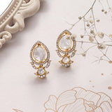 14K gold earrings with Polki and diamond oval layering for festive sparkle.