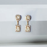Starlight Drop Polki Earrings in 18k gold with a sleek geometric silhouette
