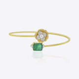 Delicate 9K gold bracelet with floral Polki centerpiece, diamond accents, and emerald toned detailing
