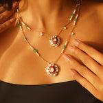14K gold necklace with floral Polki pendants and emerald beads