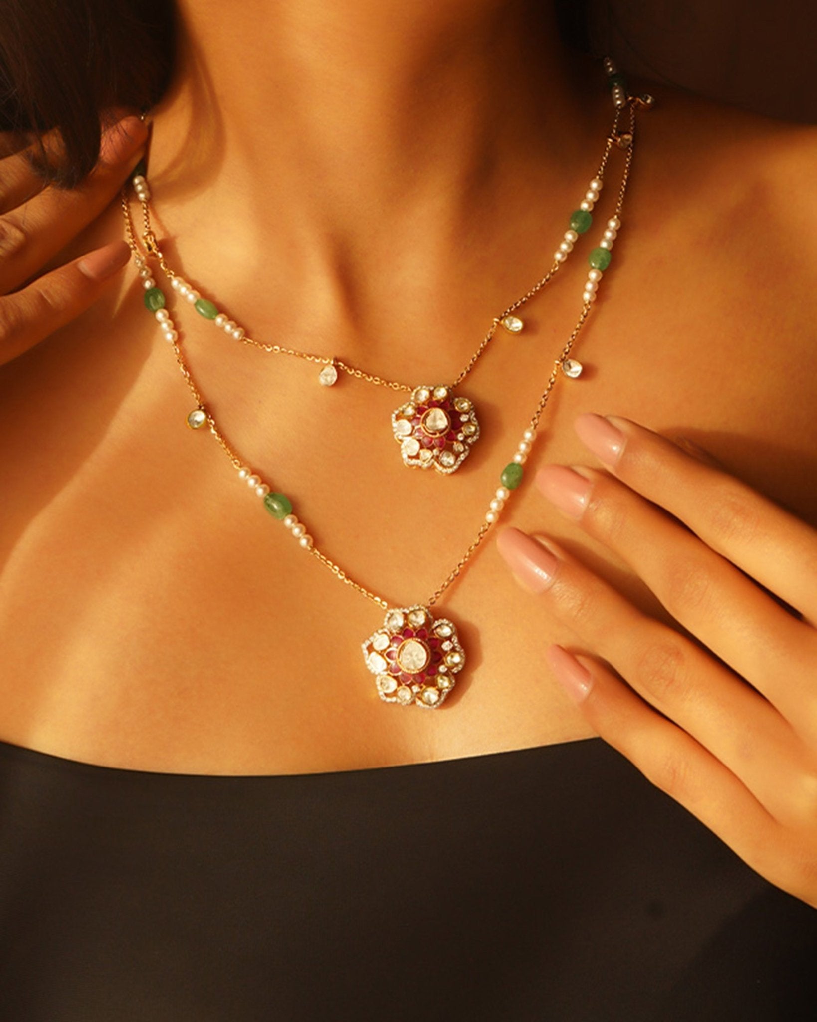 14K gold necklace with floral Polki pendants and emerald beads