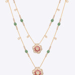 14K gold necklace with floral Polki pendants and emerald beads