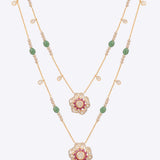 14K gold necklace with floral Polki pendants and emerald beads